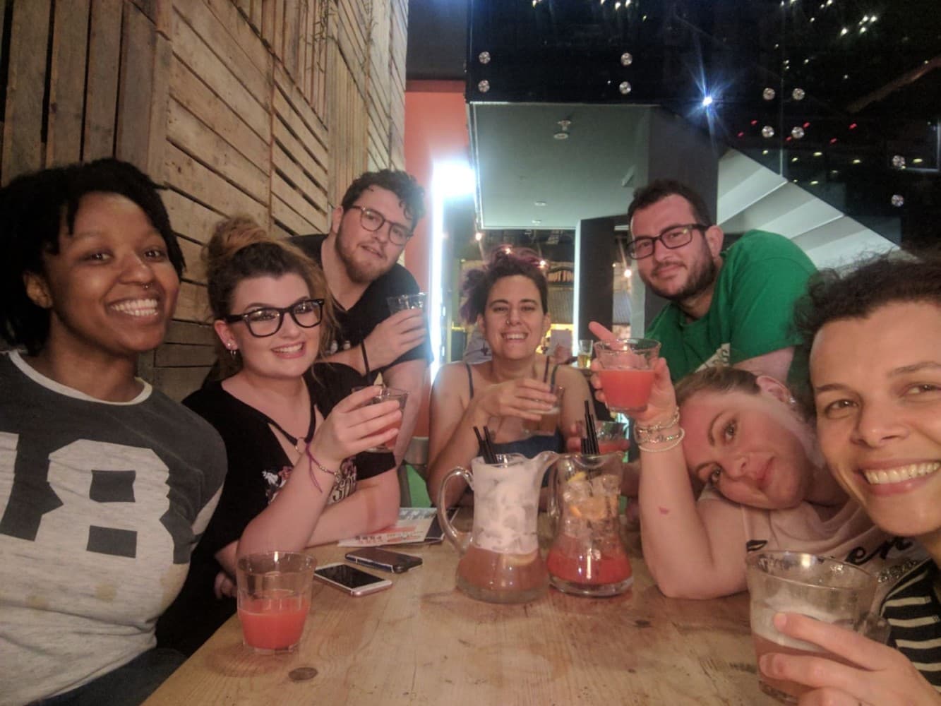 Ally with colleagues from the GAIL's team around a table